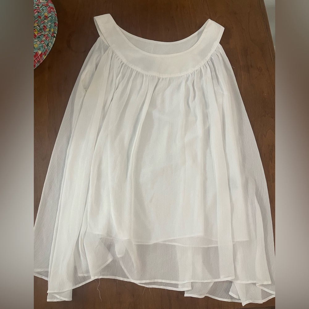 White tank top. Sheer material
